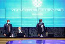Standing left, Croatian Defense Minister Mario Banožić. Standing right, Prime Minister Andrej Plenković.