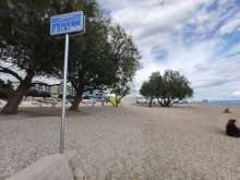Signs with COVID-19 Instructions Spotted at Split Beaches