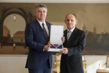 President Decorates Pilot for Flying First MIG to Croatian Side