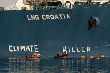 Greenpeace Activists Spray 
