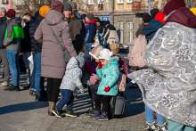 Ukrainian children fleeing Russian aggression