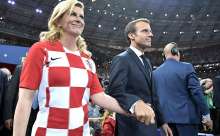 Kolinda Grabar-Kitarovic and French President Emmanuel Macron at the World Cup, 2018