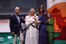 Zagreb County Tourist Board Director Ivana Alilovic collects the award